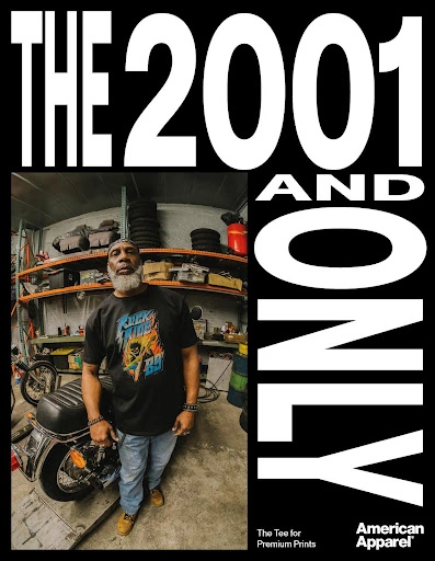 American Apparel press advert: The 2001 and Only, with a man wearing a printed black T-shirt in a workshop.