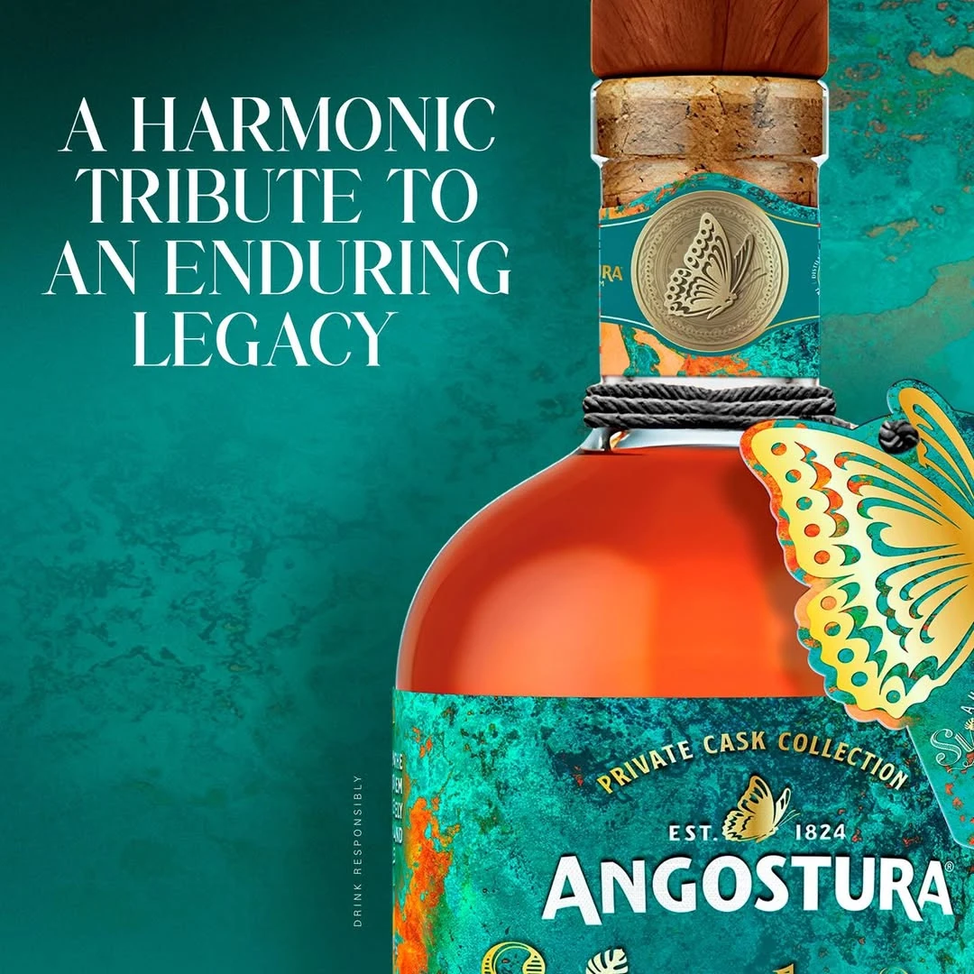 Angostura Symphony bottle detail against a teal and gold background with the line A harmonic tribute to an enduring legacy.