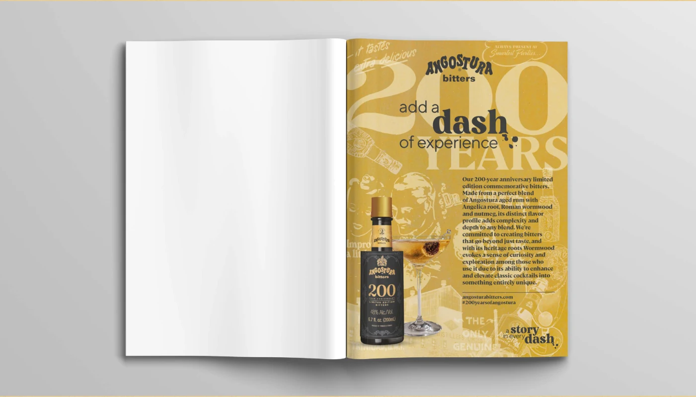 Magazine mock-up with a gold Reserve bitters advertisement, bottle and cocktail imagery.